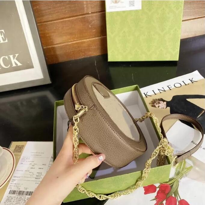 

Women Bag Designers Cross-body Bags Held Cross Body, Round bag