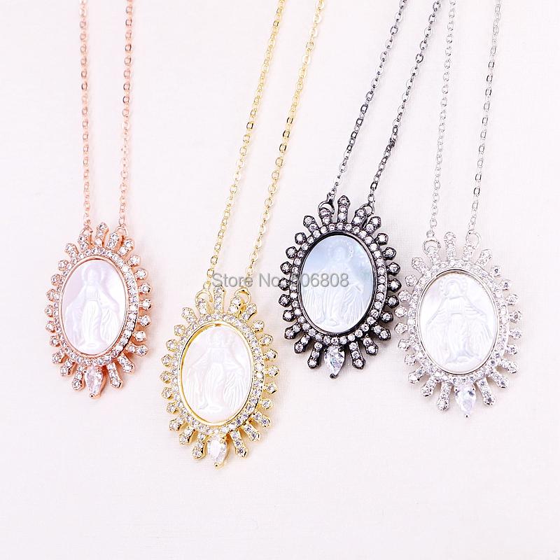 

Pendant Necklaces 5 Strands ZYZ185-8795 Crystal Zirconia Paved Natural White Mother Of Pearl Carved Jesus Fashion Necklace