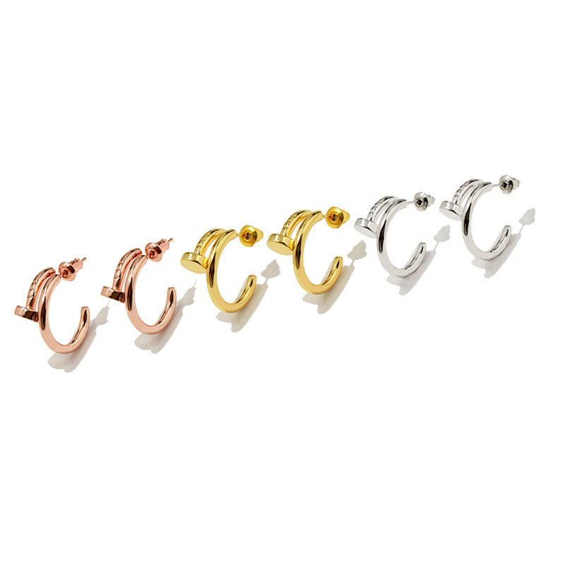 

Cae1 European and American cold wind simple design sense C-shaped metal bending nail earrings are popular in cross-border E-commerce