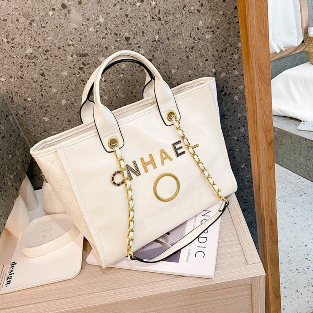 

Luxury Women's Classic Handbags Beach Bags Brand Ch Metal Badge Tote Bag Designer Small Mini Evening Handbag Female Capacity Large Leather One Shoulder Backpack Myst