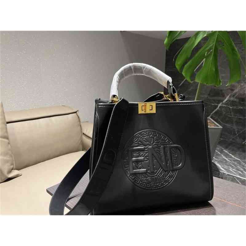 Sac à main le sac à tête de tête portable une épaule épaule de style féminin de guichet de loisirs sac fourre-tout