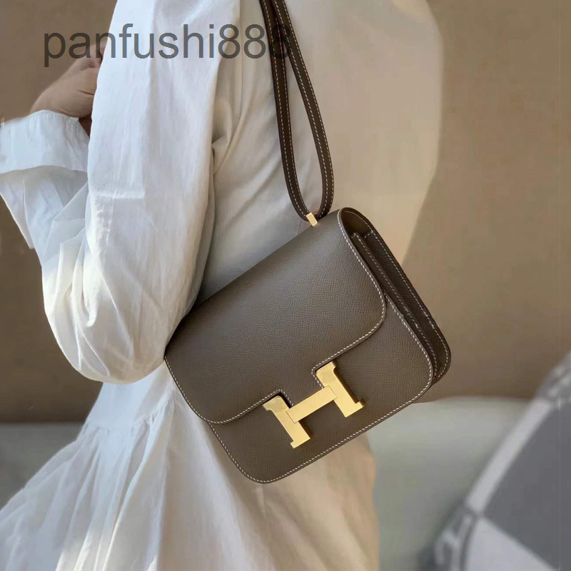 

Designer Herme Handbags bag 2022 new Kangkang advanced sense stewardess leather women's h lock small square Bag Mini One Shoulder Messenger, Brown trumpet