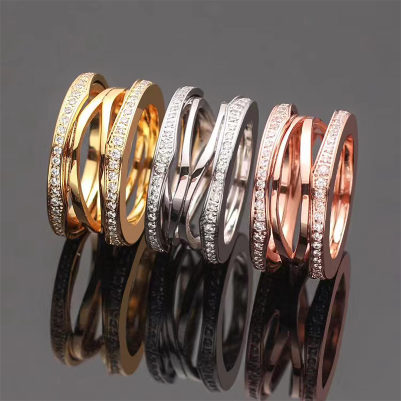 

Fashion couple Wedding Rings for Men and Women Brand classic hollow Designer Diamond Ring High quality 316L stainless steel Ring jewelry gift