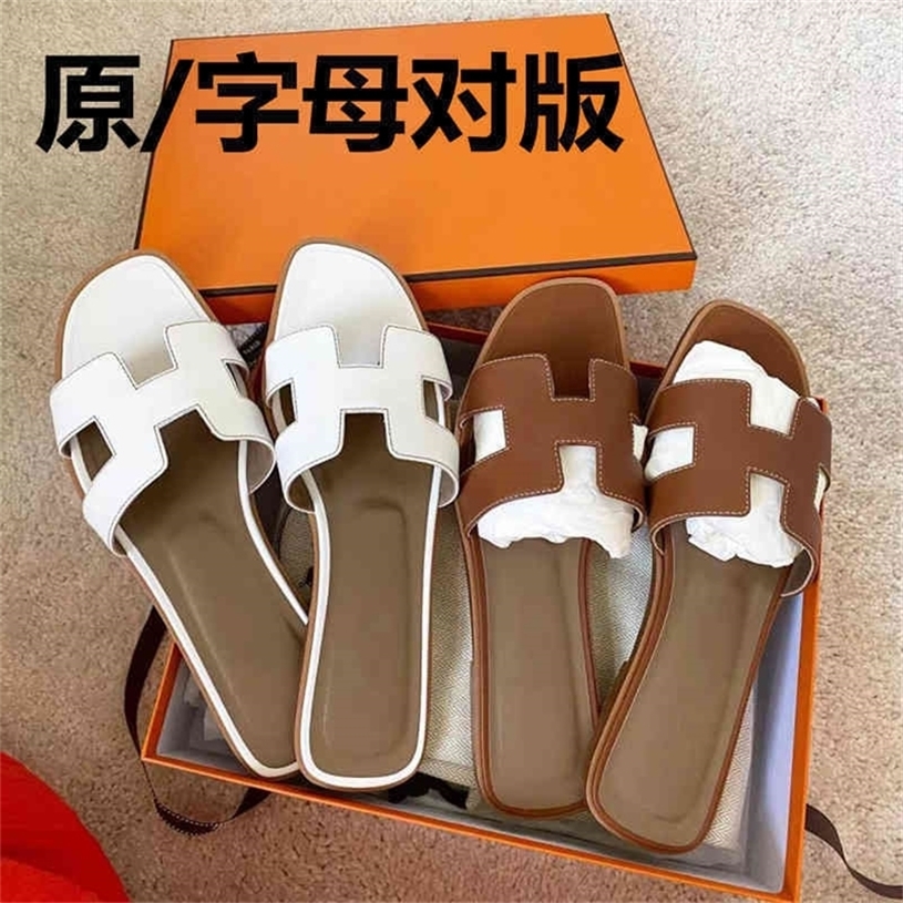 Chaussures de créateurs glissent les pantoufles en caoutchouc Herme avec Yuanbiao Channel Goods Femmes Portez la plage à fond plat en cuir plat F