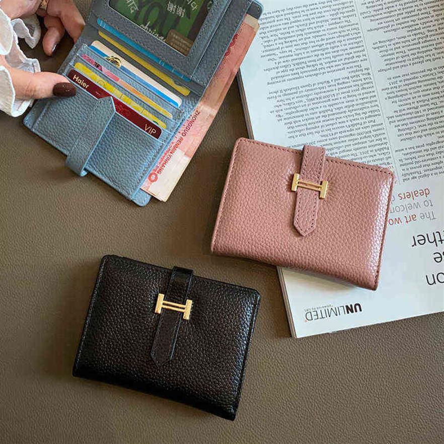 

First layer soft cowhide short h wallet women's leather small ultra-thin simple multifunctional folding Wallet316q, Black
