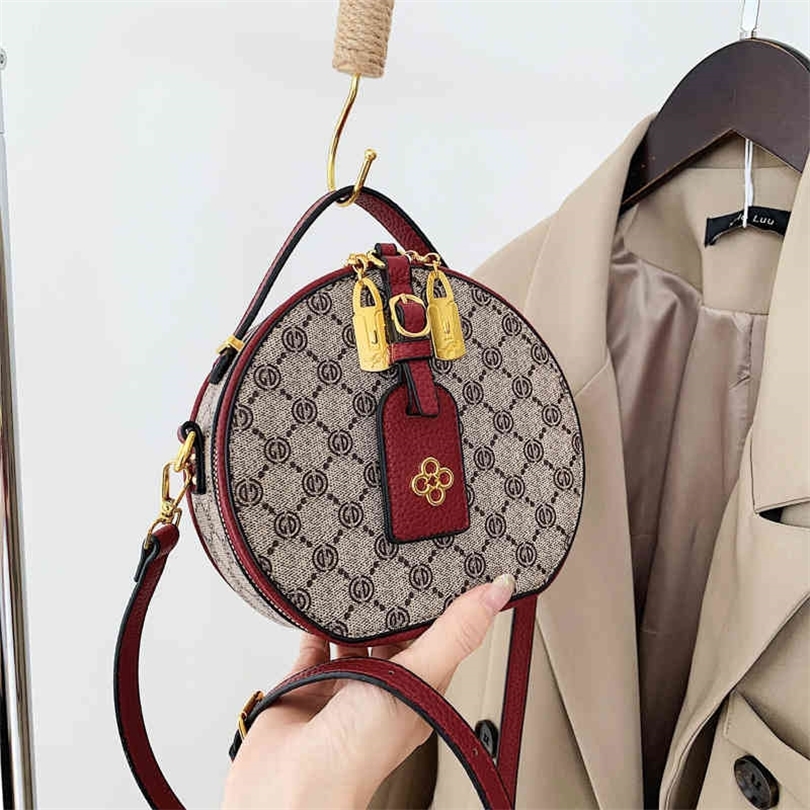 

Cheap Purses 70% Off Korean niche shoulder 2022 new color matching small round fashion women's hand messenger bag, Red