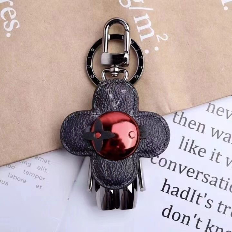 

Luxury Designer Keychain Classic Brands Key Buckle Flower Letter Pattern Genuine Leather Keychains Mens Womens Bag Pendant 2022