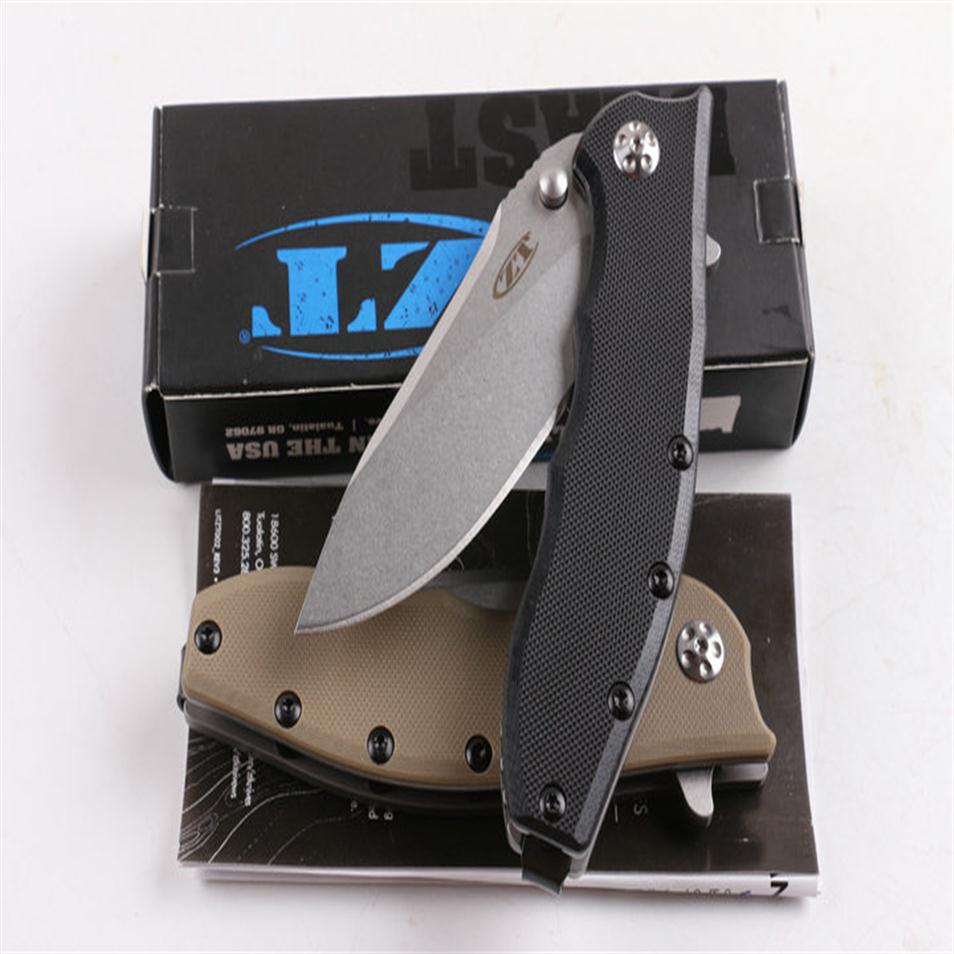 

Zero Tolerance ZT0562 Hinderer Design Tactical Folding Knife 5Cr15Mov 56-58HRC G10 Handle Stonewashed Blade Hunting Survival Pocke317W