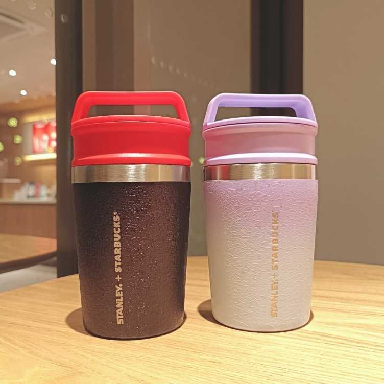 Starbucks cup Stanley co branded classic stainless steel thermos blue purple sky accompanying-image-759850944