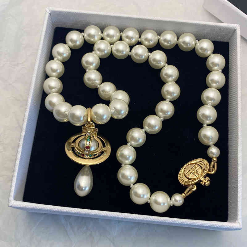 EMPRESS DOWARES XI Collier de perles conception féminine conception de la chaîne de clavicule élégante du Tempérament du pendentif Saturne en tro