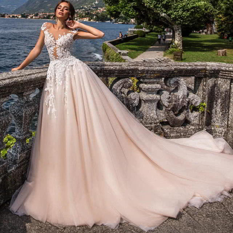 Robe de bal élégante robes de mariée pure ras du cou long balayage train dentelle Vestios De Novia robes de mariée avec boutons