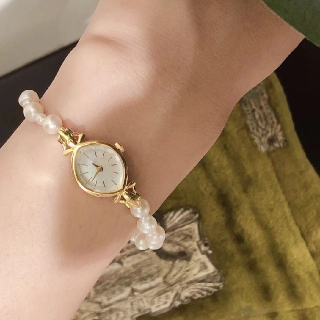 

Oval Pearl Chain Champagne Women's Watch Gold Mother-of-gold Mini Quartz Watch