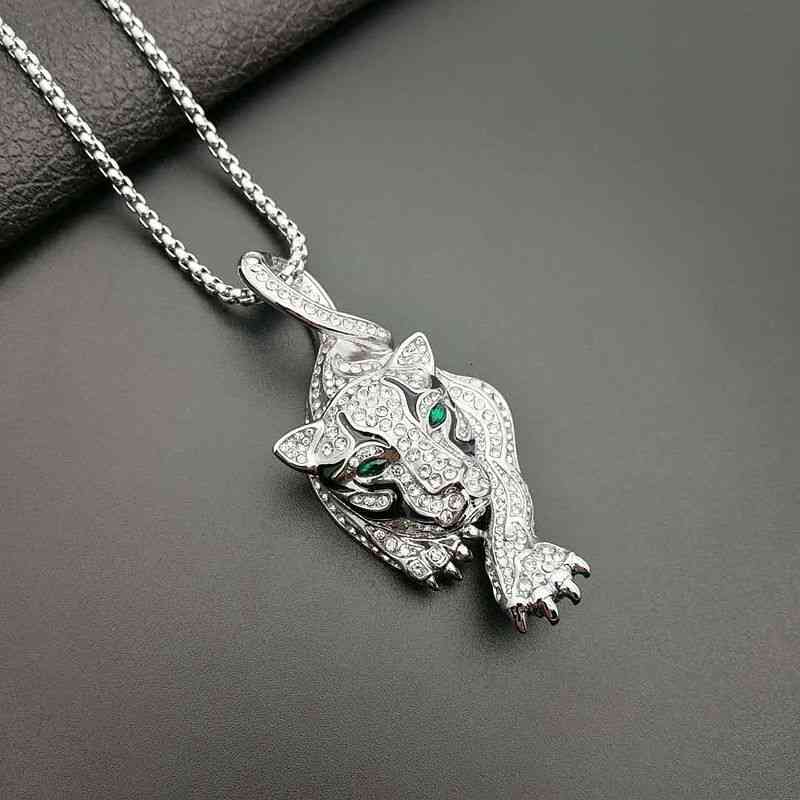 

designer Compare with the original CNew hip hop hiphop jewelry titanium steel gold plated diamond baking paint green eyed cheetah Head Pendant