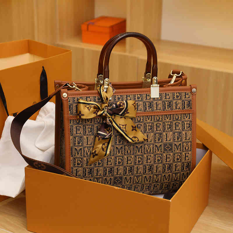 55% de réduction sur l'automne hiver nouvelle mode simple épaule en diagonale messager lettres de fleurs de grande capacité sacs à main
