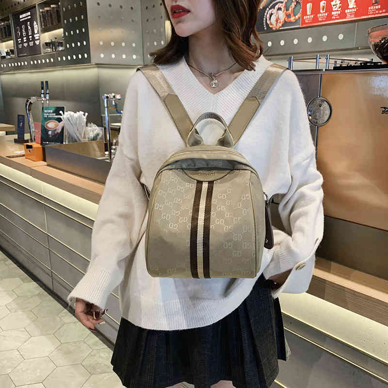 Sac à dos bag féminin 2022 Nouvelle créatrice de mode Femmes de style étranger sac à dos oxford toile légère sacs de voyage de shopping