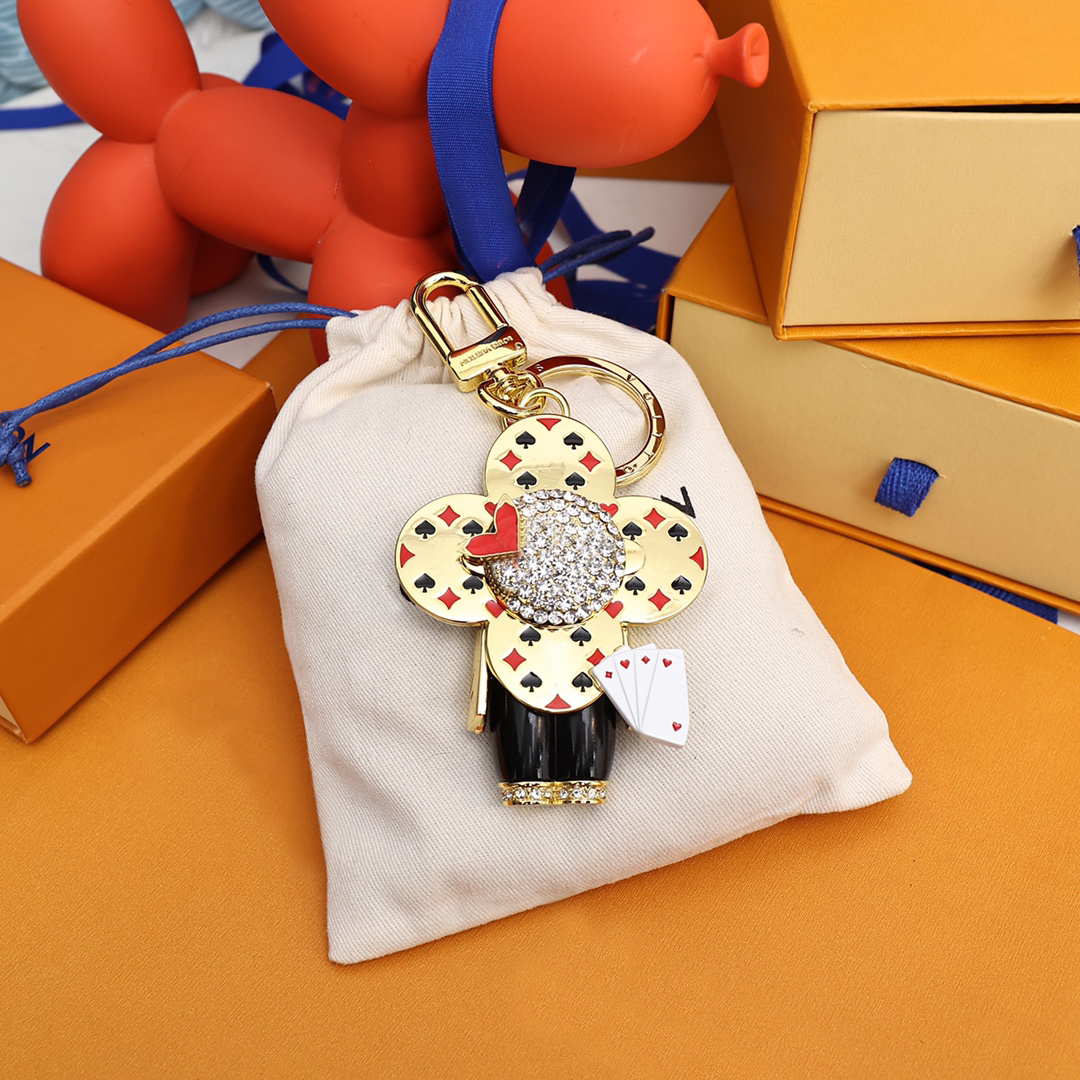 

Luxury Designer Keychain Sun-flower Doll Pendant Diamond Keychains Gold Classic Keys Buckle Cute Dolls Mens Womens Key Chain Ornaments
