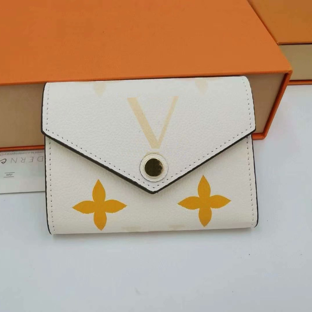 

1 GGs LVs Louiseity Viutonitys LOUISS VUTTONSs 22Ss M41938 Victorine Short Wallets Embossed Bag Women Handbag Ladies Flowers Designers Erjw, Beige