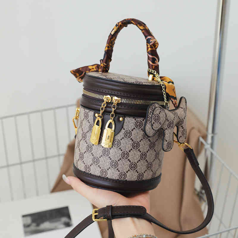 flower bag women's 2022 spring and autumn new personalized portable bucket oblique cross small commuter sling one shoulde-image-774461075
