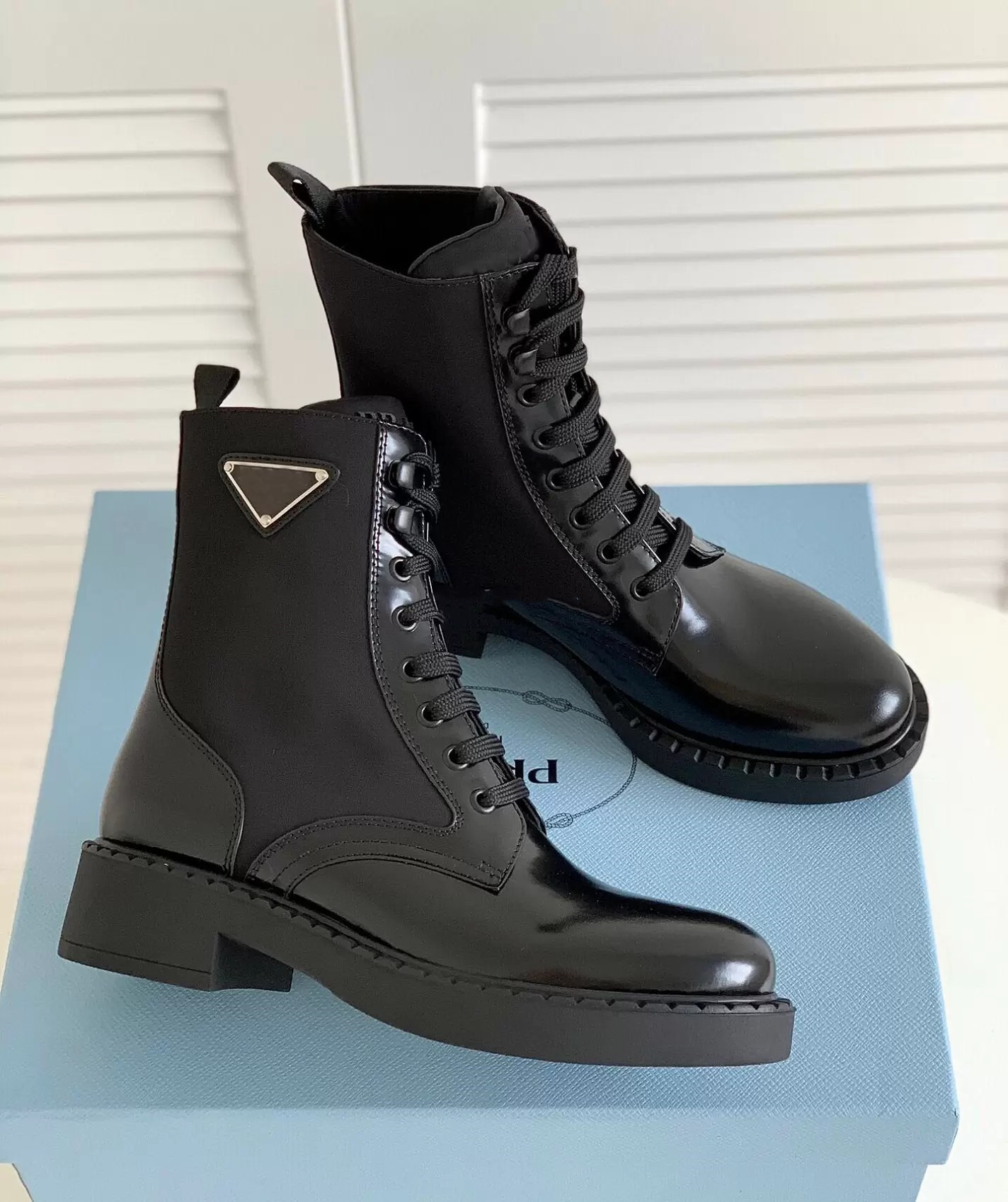 

Winter Brands Brushed Leather Re-Nylon Boots Black Recycled Enameled Metal Triangle Combat Boot Chunky Lug Sole Platform Motorcycle Booties