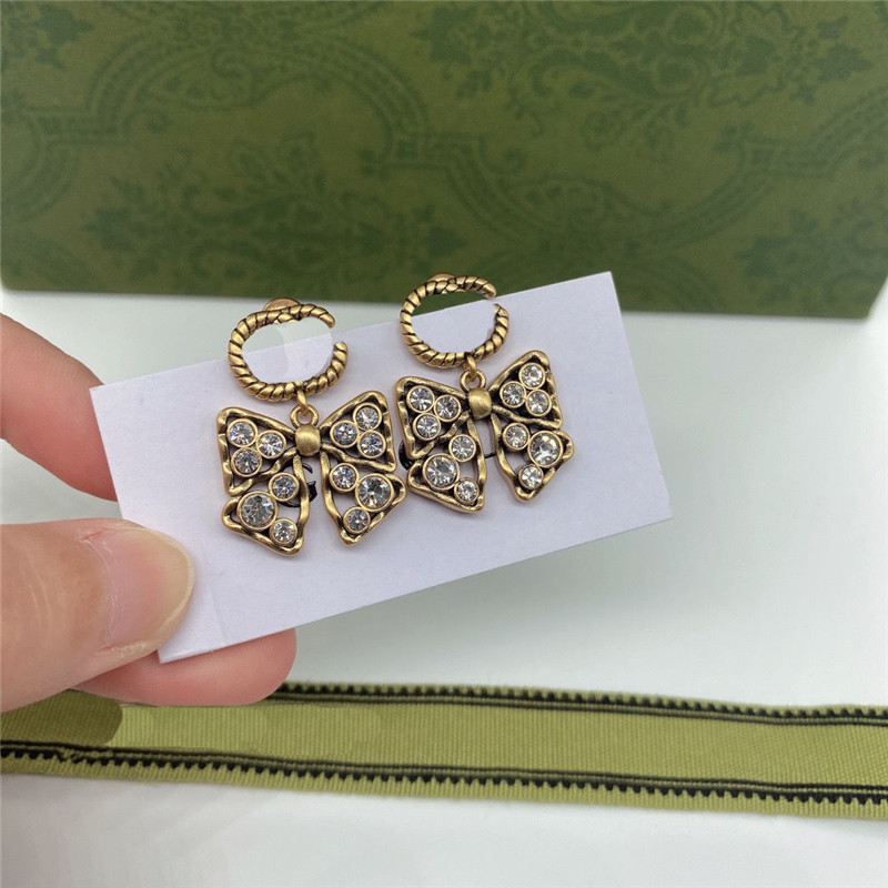 

Double Letters Bow Charm Earrings Women Diamond Pendant Studs Rhinestone Bows Eardrops Wholesale
