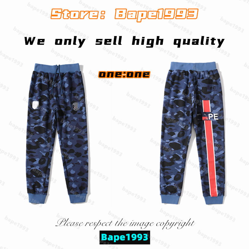

High Quality Apes Mens Pants Japan Shark B ape head Brand co-branding Galactic Luminous Spots Camouflage Male and female of the same styles 100% cotton pants 1993 CK1-14, 1 button