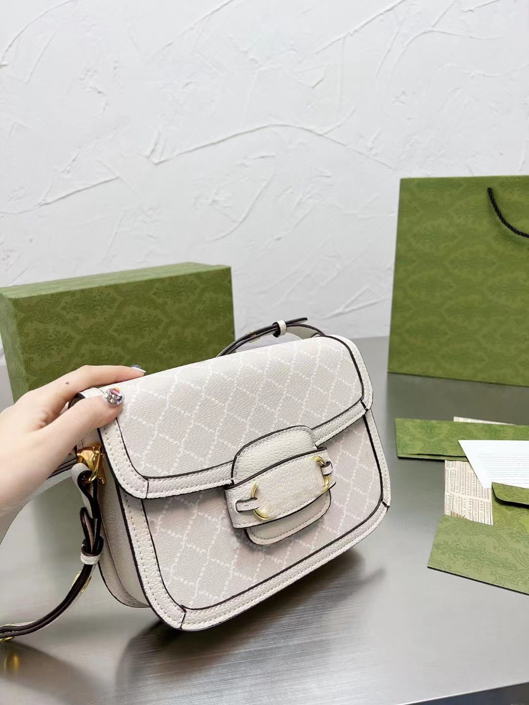 

Designer designed high quality diagonal bag. 25CM. Lettered printing., White