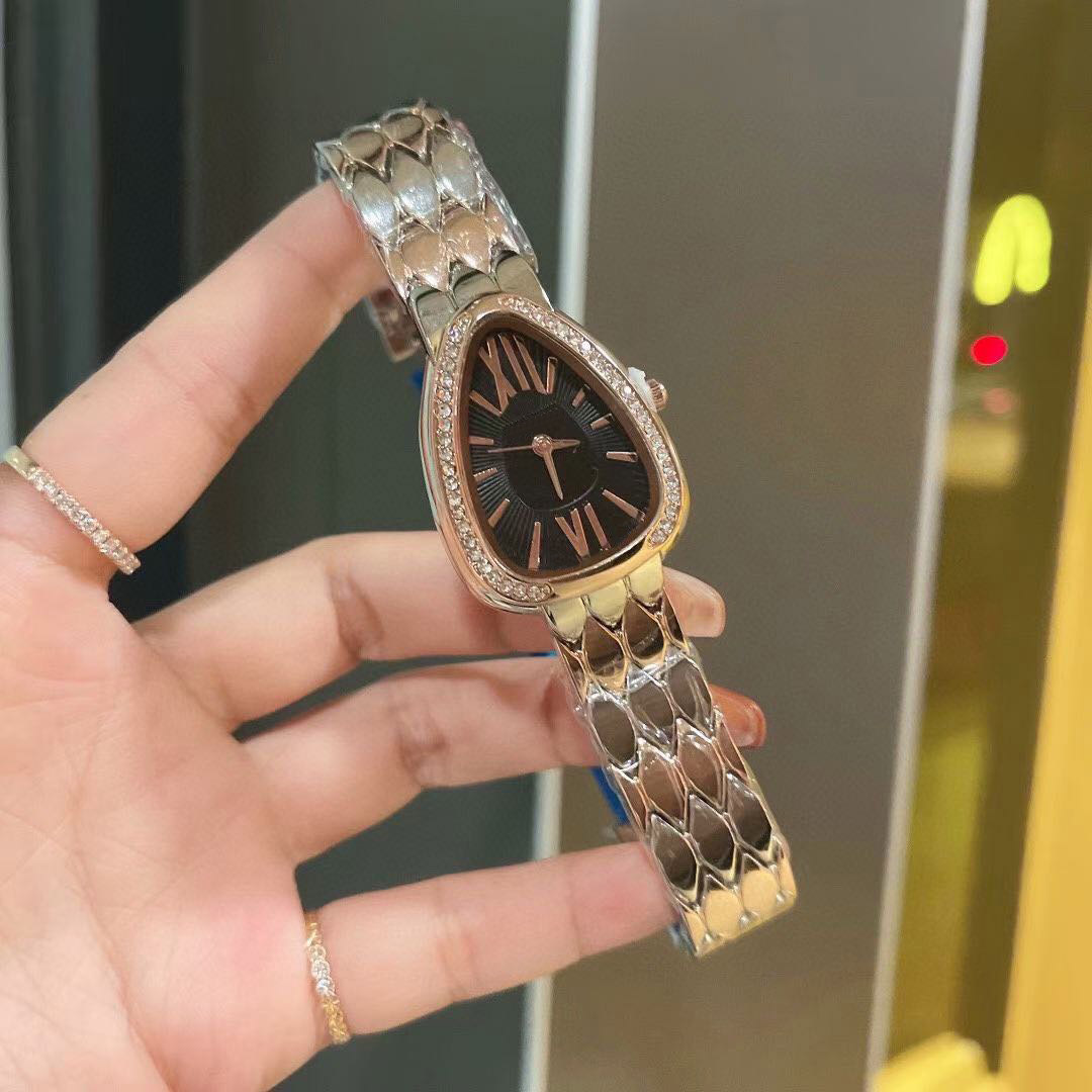 

30mm size of the ladies watch adopts the double surround type snake shape imported quartz movement diamond bezelmovement watches
