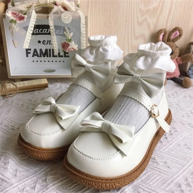 

Ladies Lolita Cute Kawaii Bowknot Heart Mary Jane Shoes Platform Fashion Goth Buckle Strap White Leather Casual Flats For Women 220616
