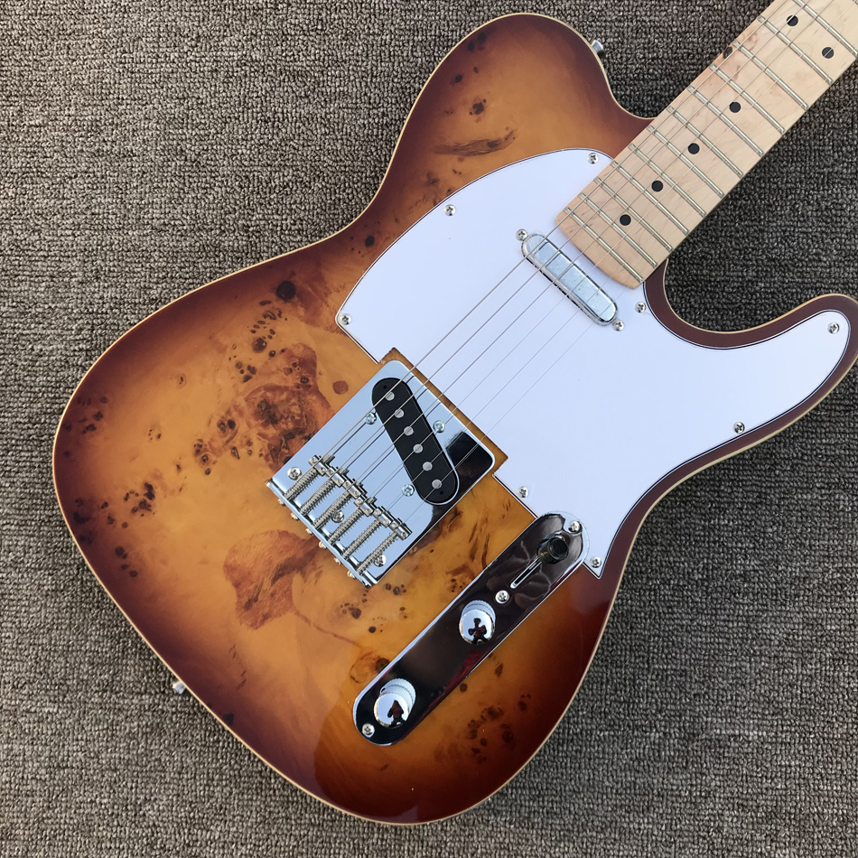 

TL electric guitar, chorme hardware, maplefingerboard, decaying wood top, solid mahogany body guitar