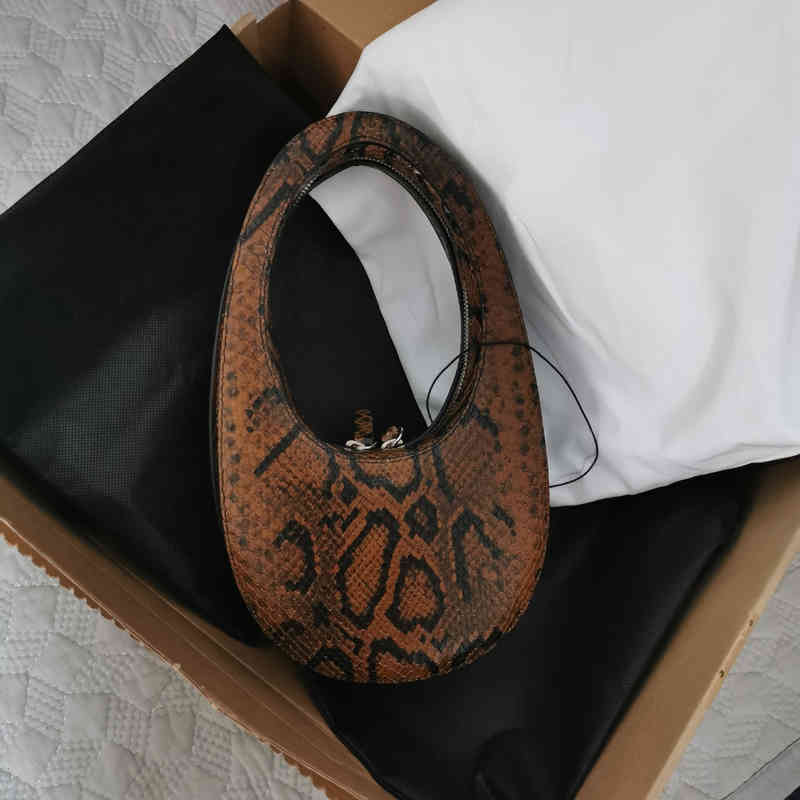 

designer oval bag Minority Female Portable Leather Cowhide Snake Pattern Three-dimensional Egg Bag Small Round Bag 220528, Black