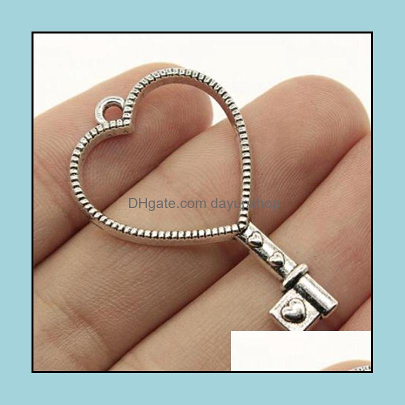 

Charms Jewelry Findings Components 100Pcs/Lot Antique Sier Plated Hollow Love Heart Key Pendants For Making Dhsqy