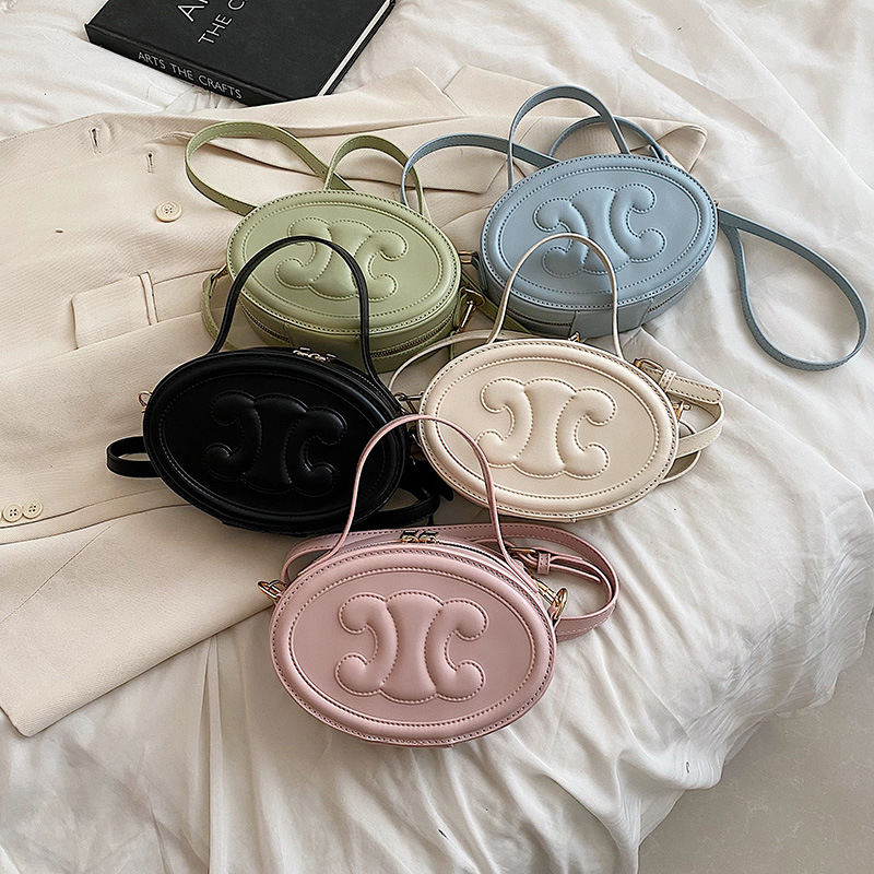 

Cross Body bag Summer small round package fashion simple solid color single shoulderembossed flowers yangqi niche female, Black