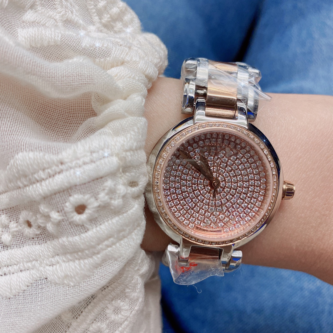 Montre pour femme Mouvement à quartz Montre saphir Boîtier en acier inoxydable Cadran en céramique Diamètre de la surface 30 Boucle à trois volet
