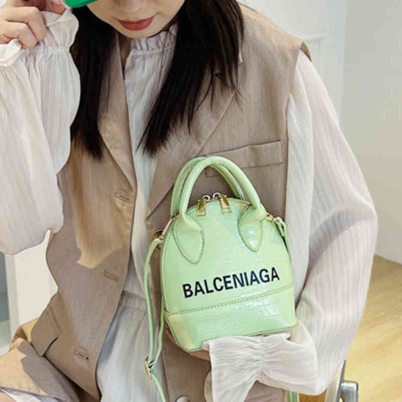 Outlet Urban bag female 2022 new candy color stone letter portable One Shoulder Messenger style bright face shell bag-image-771846829