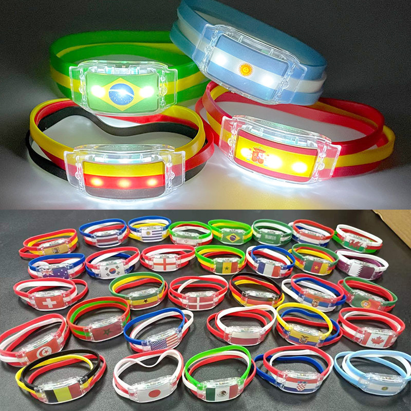 

Party Favors Qatar World Cup glowing flag bracelet football fans cheering props silicone flash led wristband with country flag logo
