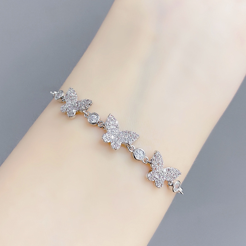 

Korea new micro-set shiny zircon butterfly bracelet jewelry niche design luxury 18k gold plated pull bracelet for women