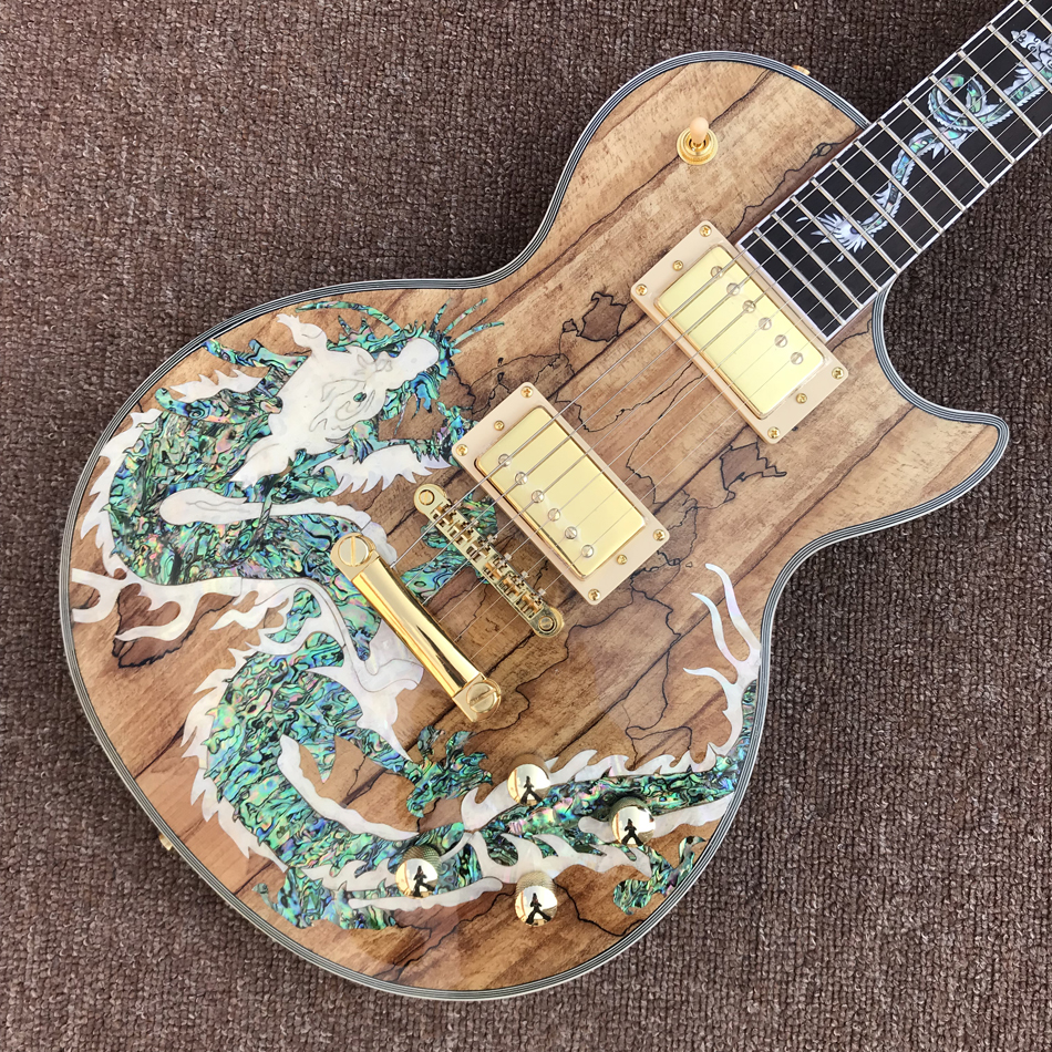 

Custom LP electric guitar, gold hardware, dragon abalone inlaid rosewood fingerboard, Dinosaur abalon decaying wood top, solid mahogany body guitar