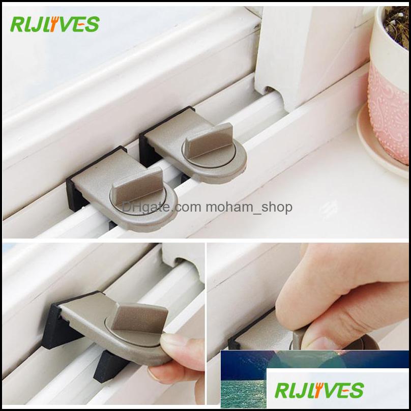 

Other Household Sundries Home Garden 1Pc Move Window Child Safety Lock Sliding Windows Kids Cabinet Locks Door Stopper Security Sash Drop