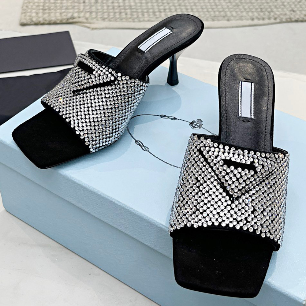 

Satin heeled sandals with crystals A new twist on the brand's iconic triangle logo turns it into a lightly padded leather detailed sandal for famous designer woman, Shipping supplement