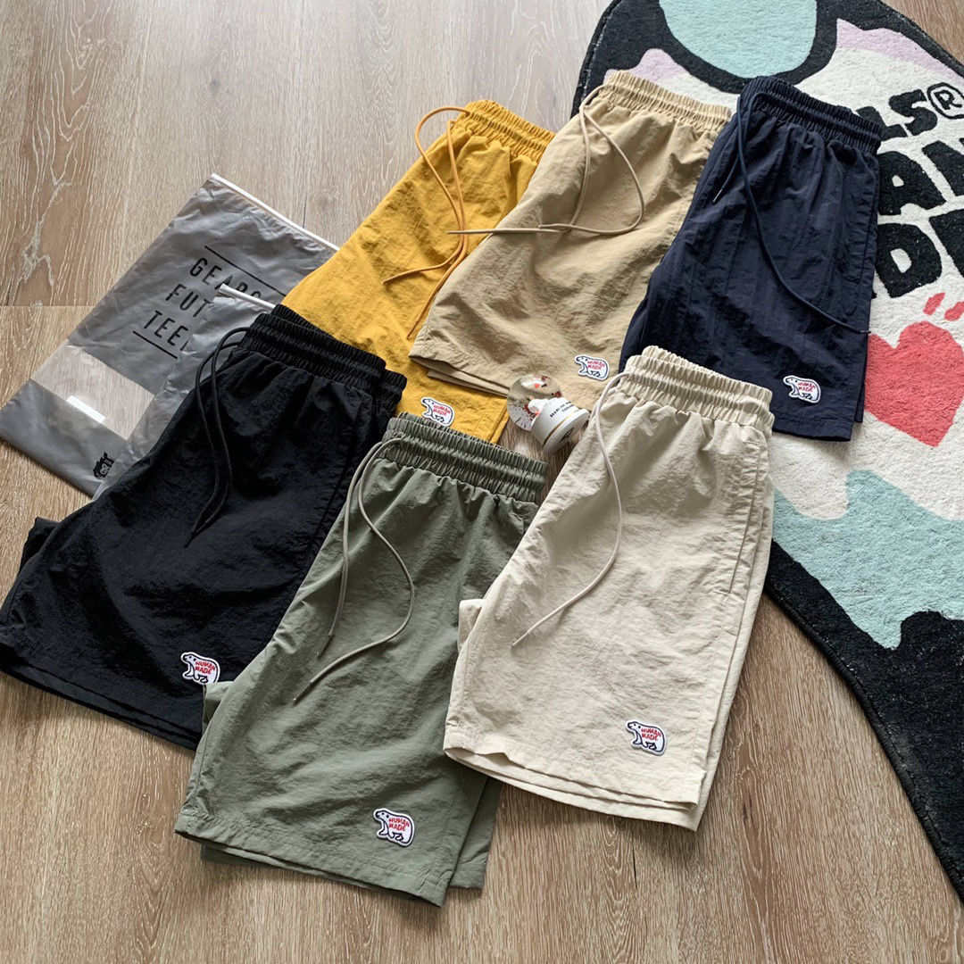 

Nigo Human Made Mens and Women Couple Japanese Polar Bear Beach Loose Casual Sports Shorts, Beige