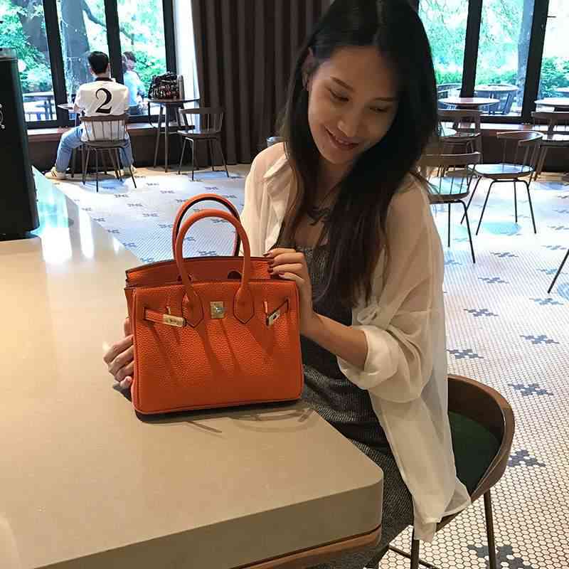 

Herme Birkins 25cm Litchi Pattern Bag Hand