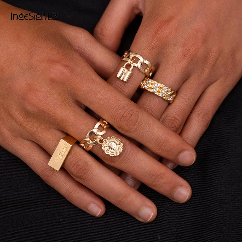 

Cluster Rings IngeSight.Z 4Pcs/Set Punk Gold Color Flower Padlock Pendant Luxury Shiny Rhinestones Knuckle Finger Ring For Women JewelryClus
