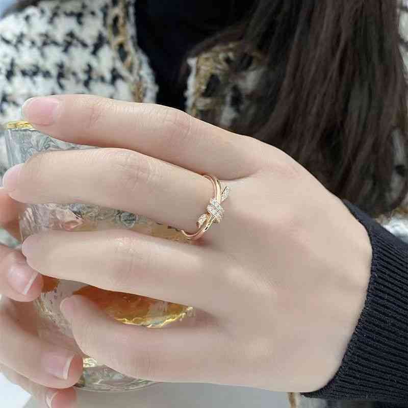 

Knot RING 925 Sterling Silver minority design simple ins light luxury Korean diamond inlaid high sense French couple ring category