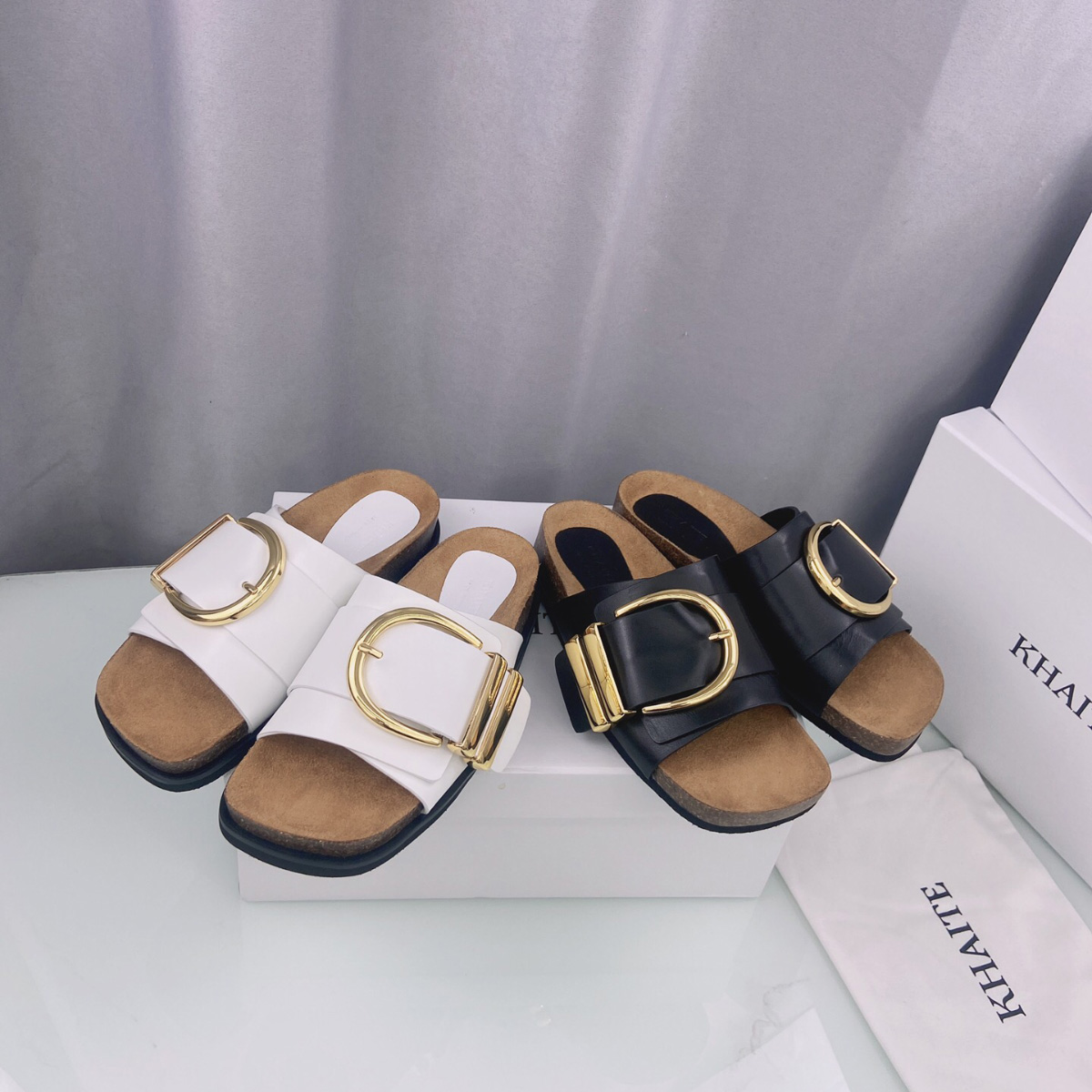 

Khaite Thompson buckled leather slides slippers Luxe slip-on beach sandals shoes Genuine leather open toe casual flats for women Luxury Designers factory footwear, Black
