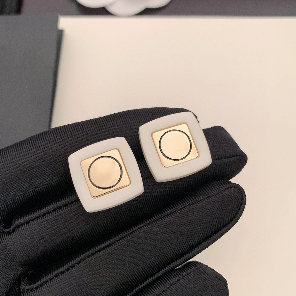 Acrylique blanc bijoux de mode perles boucles d'oreilles charme marque de luxe fête concepteur marque boucle d'oreille femmes beau célèbre cuivre