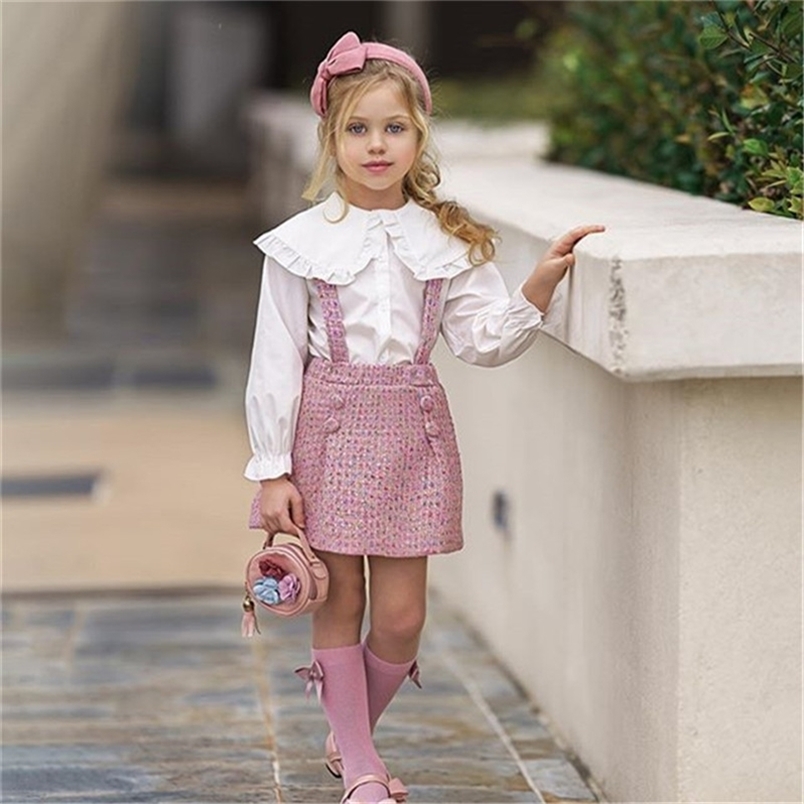 Beaux enfants bébé filles vêtements 2pcs costume col claudine chemise à manches longues jupe à bretelles à carreaux pour les tenues d'automne pri