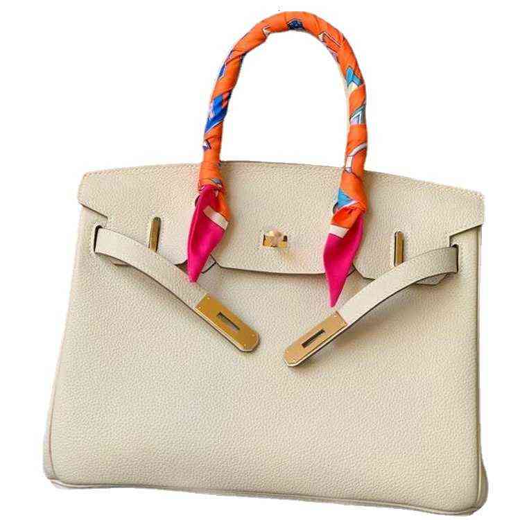 

Togo Leather Bridal Handbag with Buckle, Like