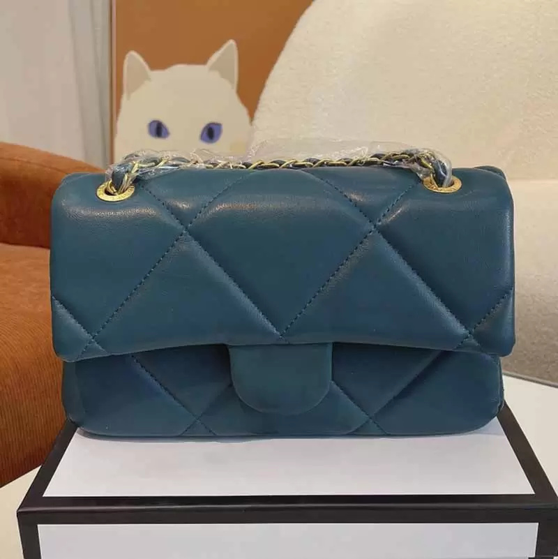 Mini rabat de concepteur sac à bandoulière Femmes Couleur solide en cuir en cuir en peau d'agneau Classic sacs à main diamant rhombus métal messa