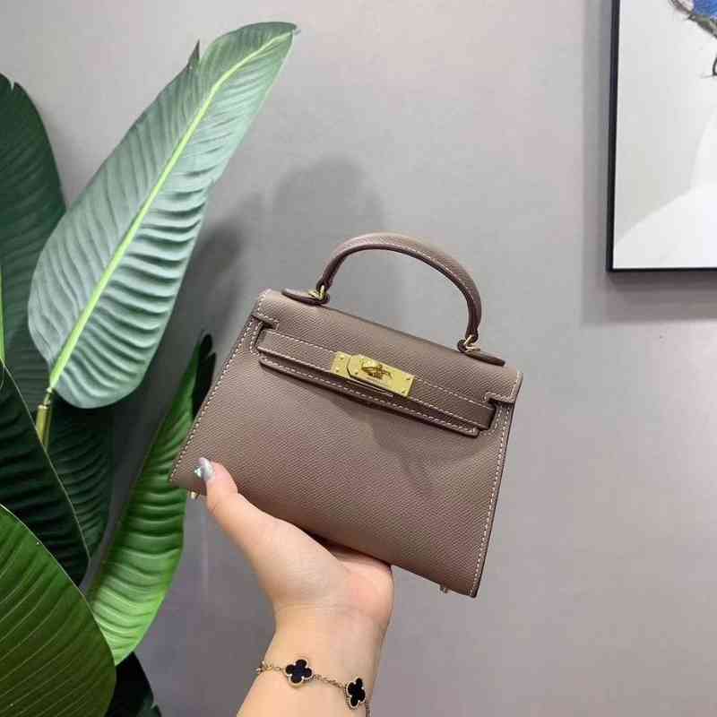 

Luxury Handbag Herme Keilys Designer Bags the Mini Portable Shoulder Messenger Bag Is Made Cow Leather. Zly