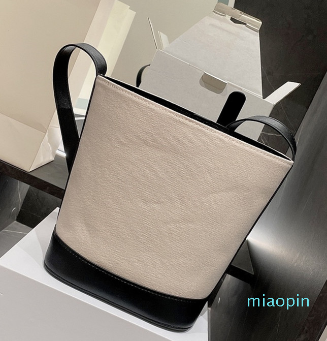 

High quality latest calfskin design bucket bag two-color splicing fashion luxury retro style shoulder bag Canvas, Make up the difference